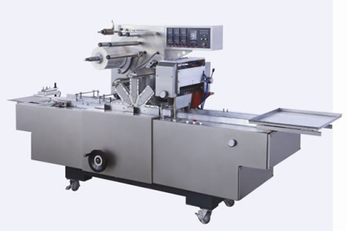 自動透明膜轉(zhuǎn)塔式包裝機圖片