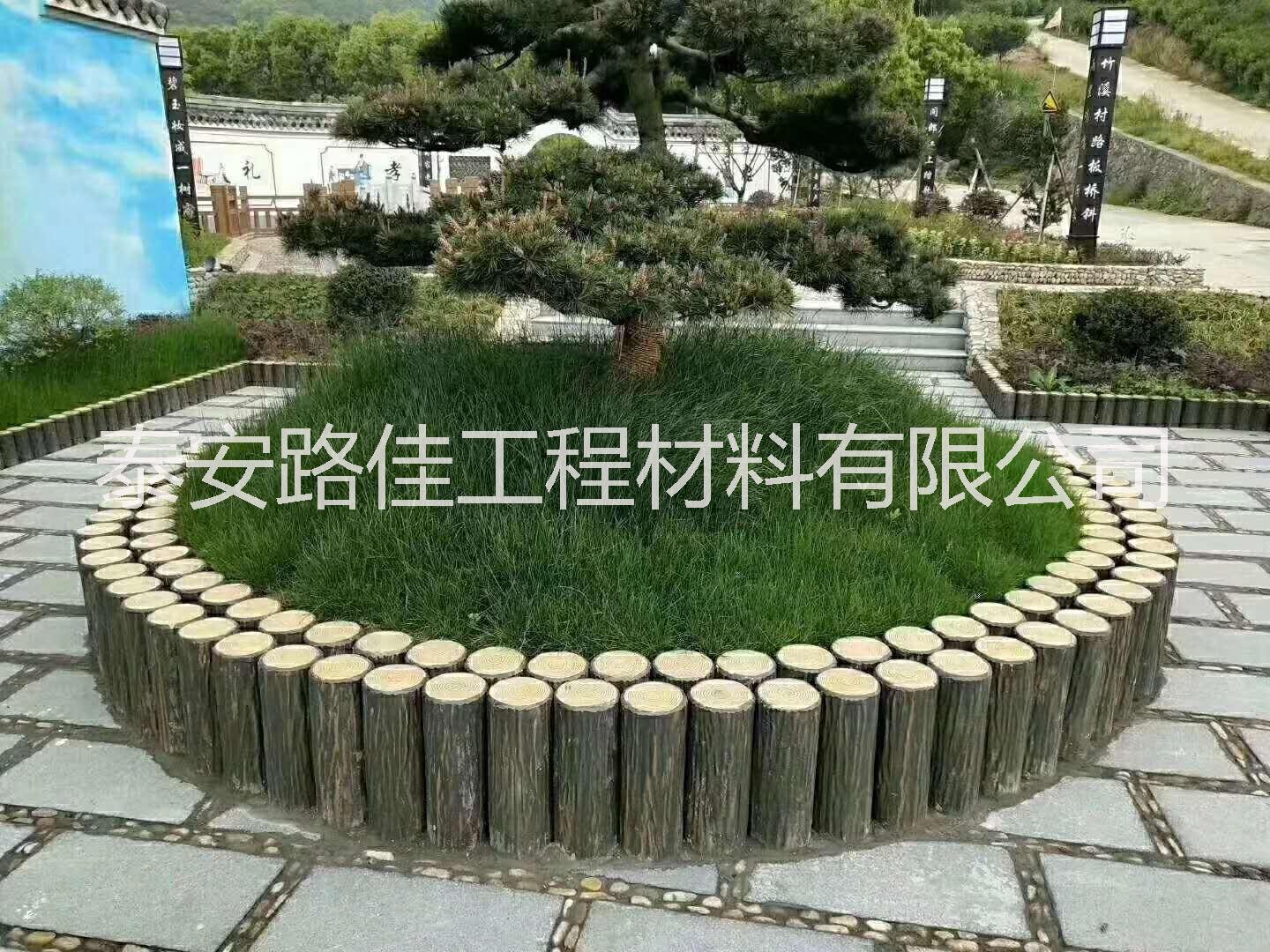 供應(yīng)水泥仿木護(hù)欄 仿木路沿樁圖片