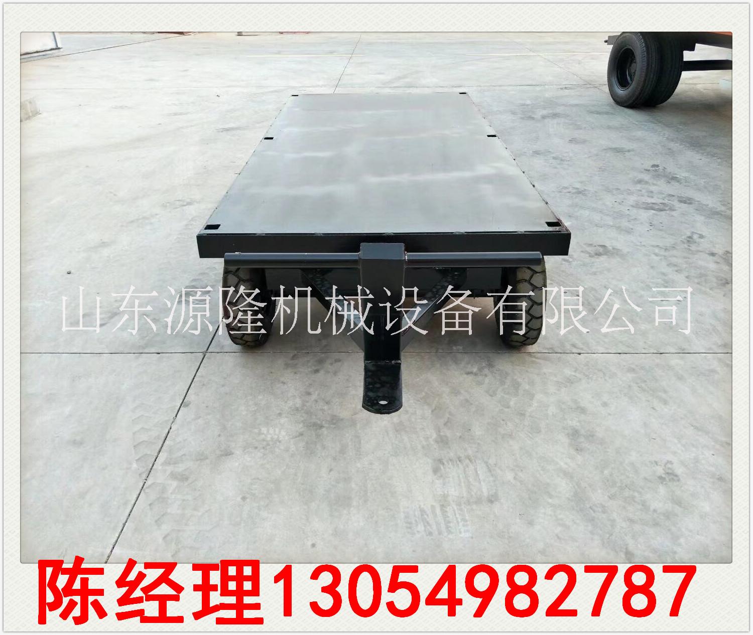 廠區(qū)手動平板拖車圖片