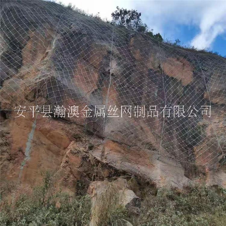 贵州兴义矿山边坡绿化防护网公路山体防滑坡落石网SNS主动防护网价格拦石被动柔性防护网图片