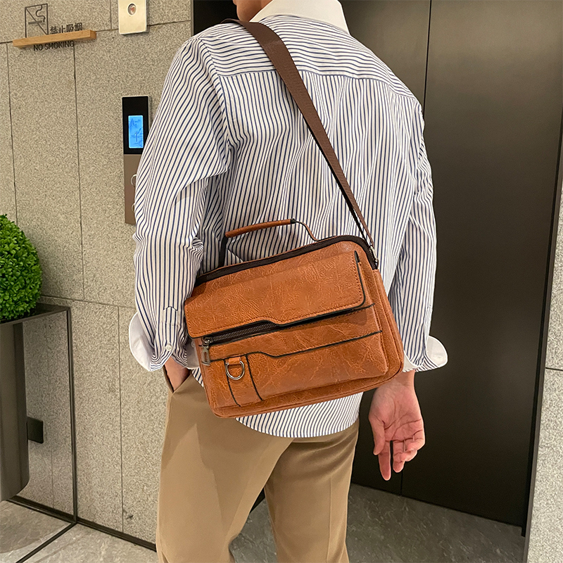 新款橫版男士手提包大容量質(zhì)感商務(wù)休閑斜挎包都市風(fēng)男包