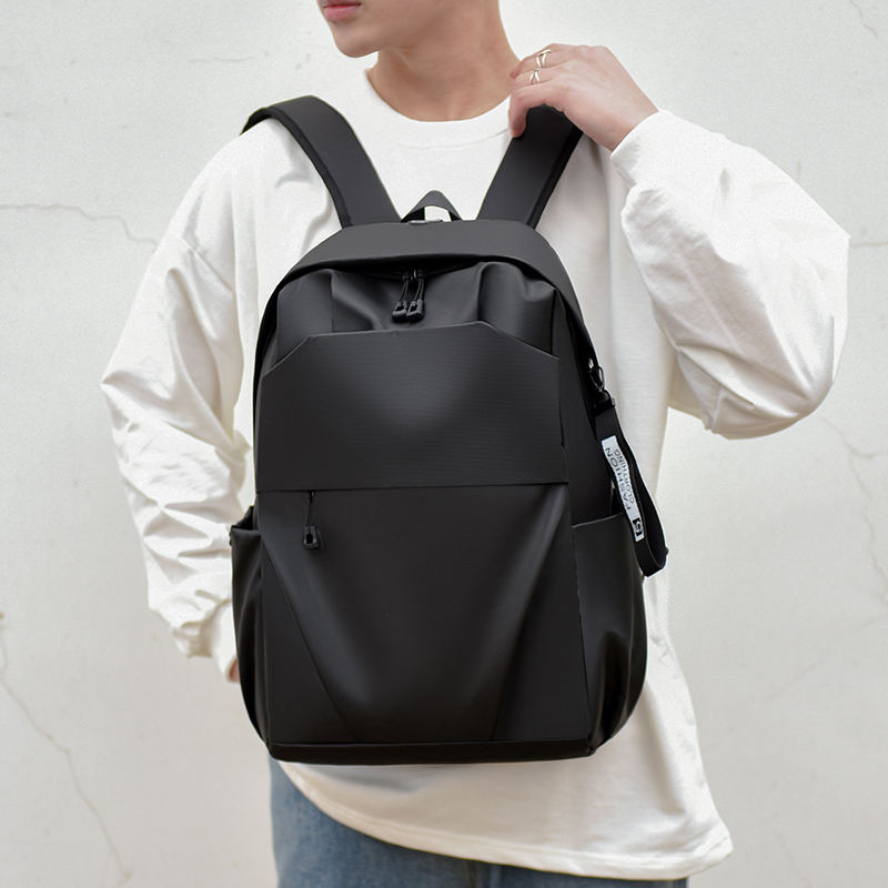 簡(jiǎn)約休閑包大容量雙肩包商務(wù)通勤旅行包防潑水潮流筆記本電腦背包