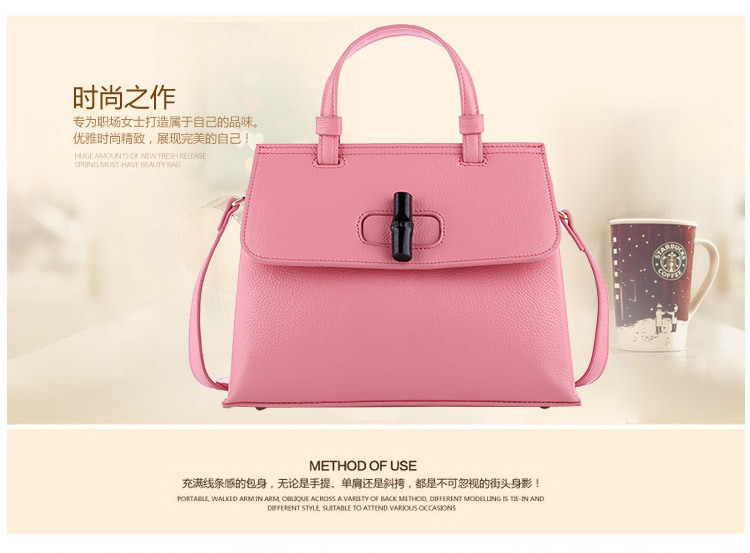 廣州女包工廠頭層牛皮女包時(shí)尚笑臉竹節(jié)包