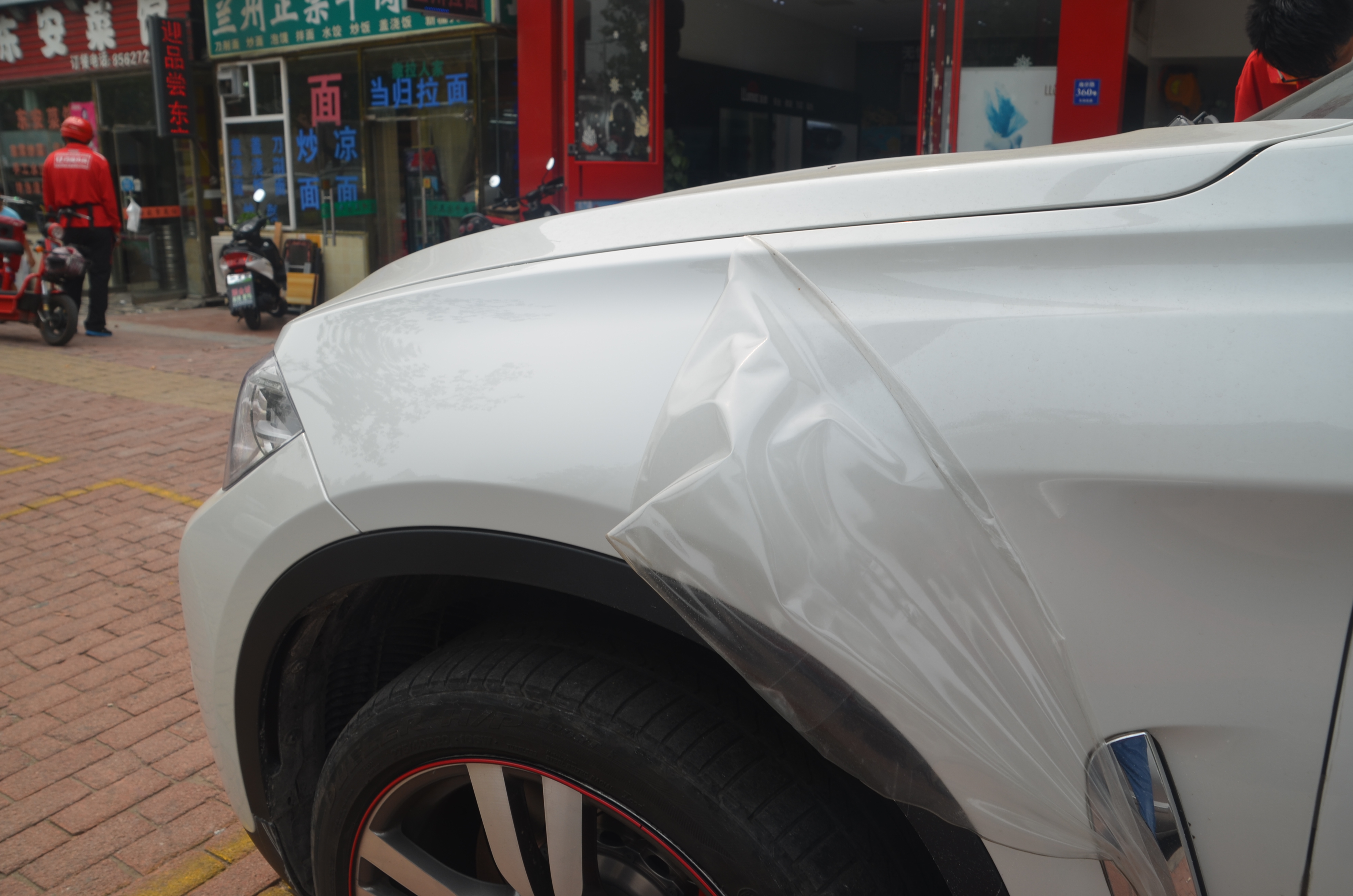 青島寶馬貼隱形車(chē)衣有限公司