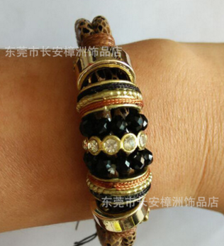 廠家直銷樟洲飾品 時(shí)尚新款豹紋繩外車線加*合金配件純手工編織手鏈
