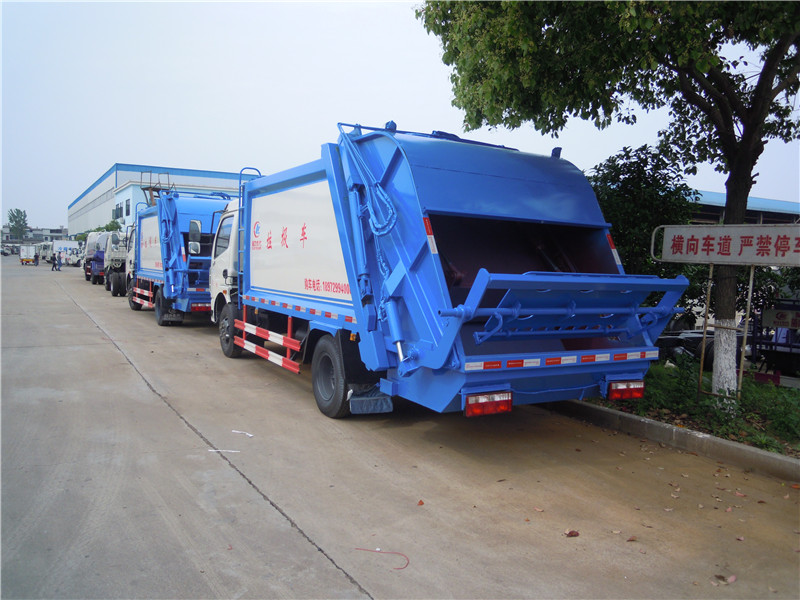深圳國五壓縮式垃圾車_東風(fēng)多利卡7立方環(huán)衛(wèi)壓縮垃圾車的價格