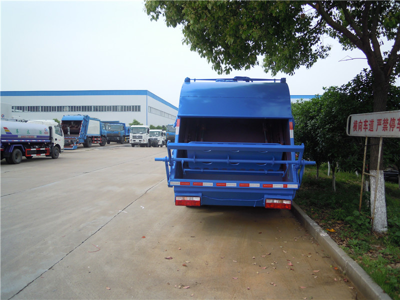 深圳國五壓縮式垃圾車_東風(fēng)多利卡7立方環(huán)衛(wèi)壓縮垃圾車的價格