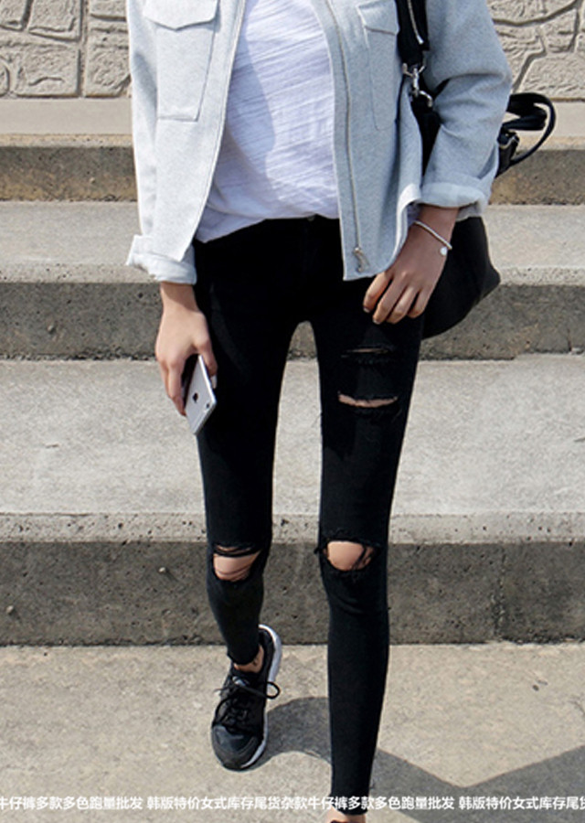 東莞服裝廠家萬件庫存尾貨牛仔褲清