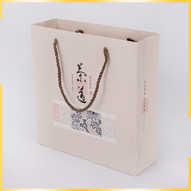 廠家直銷通用茶葉包裝手提袋銅版紙袋禮品袋購(gòu)物包裝袋量大優(yōu)惠 茶葉包裝袋