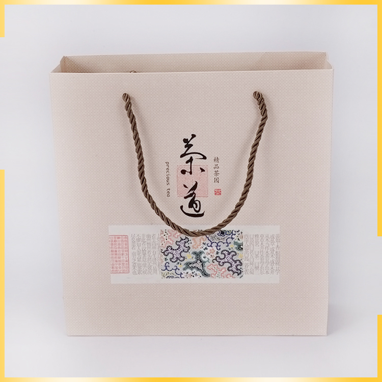 廠家直銷通用茶葉包裝手提袋銅版紙袋禮品袋購(gòu)物包裝袋量大優(yōu)惠 茶葉包裝袋