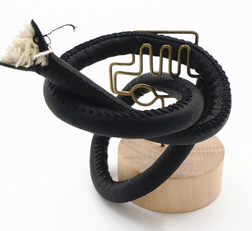 批發(fā)供應8MM包棉芯車線皮革圓條鎖邊PU帶子手袋挽手鞋子合縫帶子