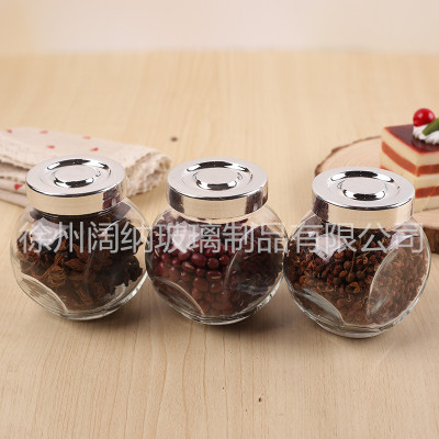 廠家直銷(xiāo)扁鼓玻璃儲(chǔ)物罐喜糖糖果瓶花茶密封瓶玻璃蜂蜜瓶調(diào)味瓶