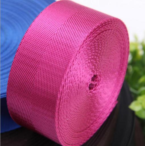 廠家直銷仿尼龍?zhí)峄棊КF(xiàn)貨批發(fā)加厚箱包織帶彩色環(huán)保尼龍織帶