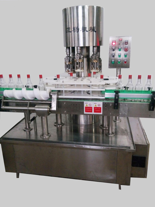 三楊機械全自動旋蓋機 旋蓋機報價 旋蓋機批發(fā) 旋蓋機供應商 全自動旋蓋機 長沙旋蓋機 全自動白酒瓶封口機