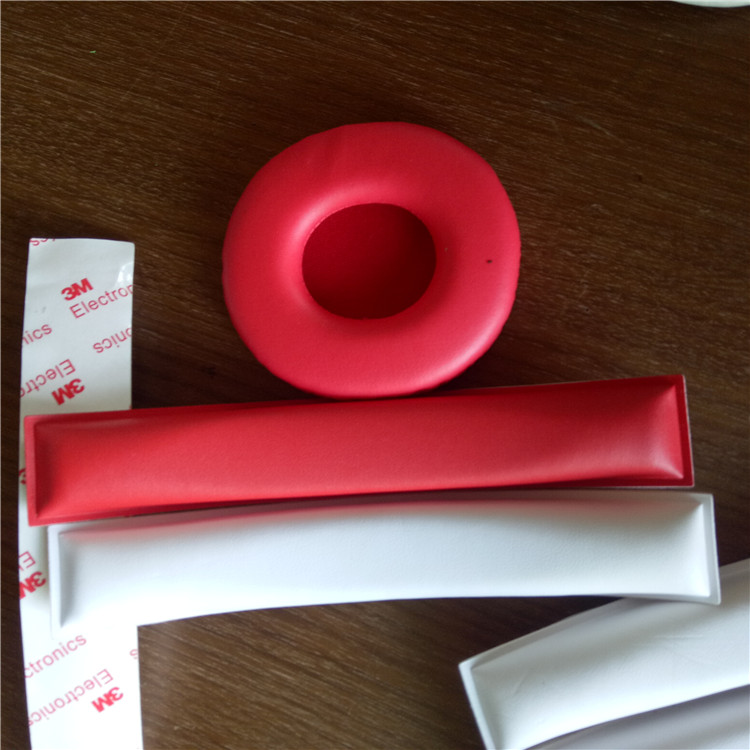 供應(yīng)頭戴式耳機(jī)熱壓海綿頭條加工 皮耳套廠家直銷(xiāo)