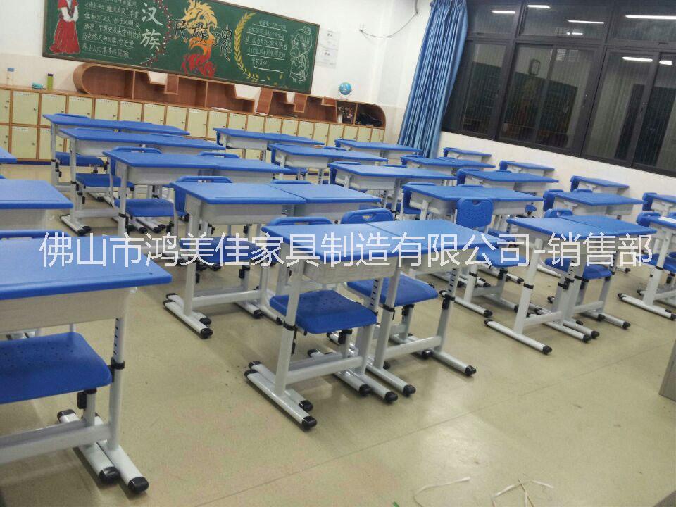 兩人位塑鋼課桌椅，小學(xué)生課桌椅廣東鴻美佳廠家定制