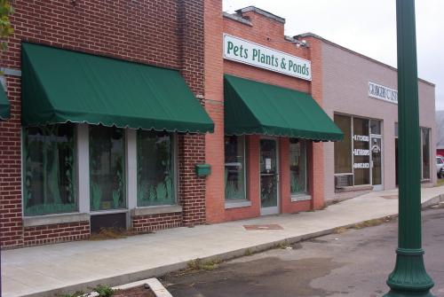 蘇州優(yōu)捷特遮陽雨篷 蘇州優(yōu)捷特大型倉儲式推拉棚 蘇州法式固定蓬 江蘇固定蓬