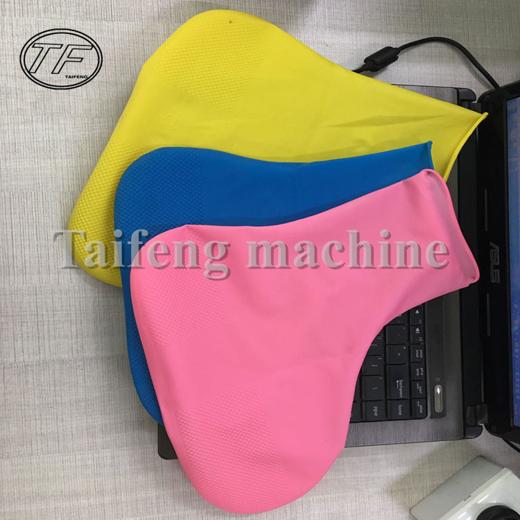 乳膠腳套生產(chǎn)機器 防滑防水防沙乳膠腳套生產(chǎn)線 旅游裝便攜乳膠腳套機器公司