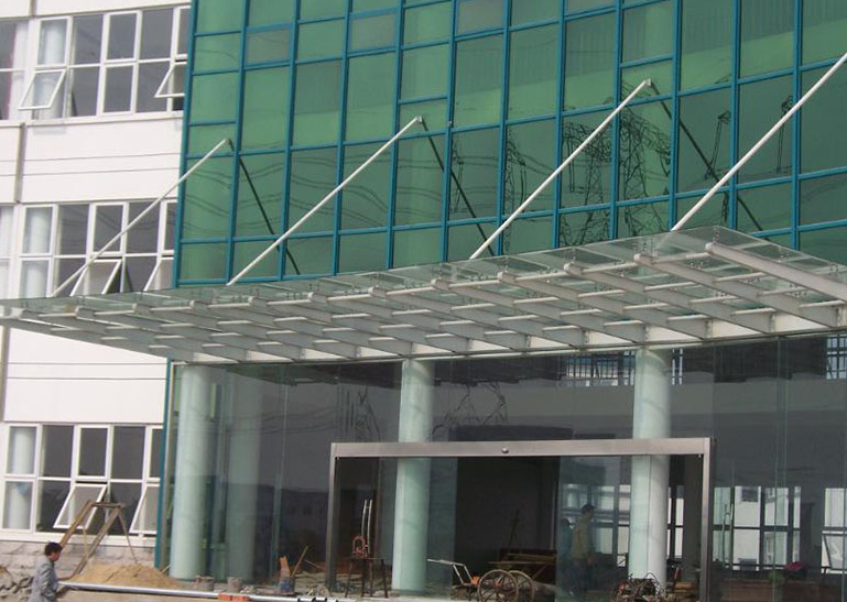 酒店大門鋼化玻璃雨棚  定制酒店大門鋼結(jié)構(gòu)雨篷 鋼結(jié)構(gòu)玻璃雨棚