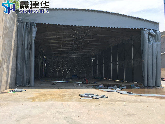 新泰市戶外伸大型縮推拉雨棚鑫距華