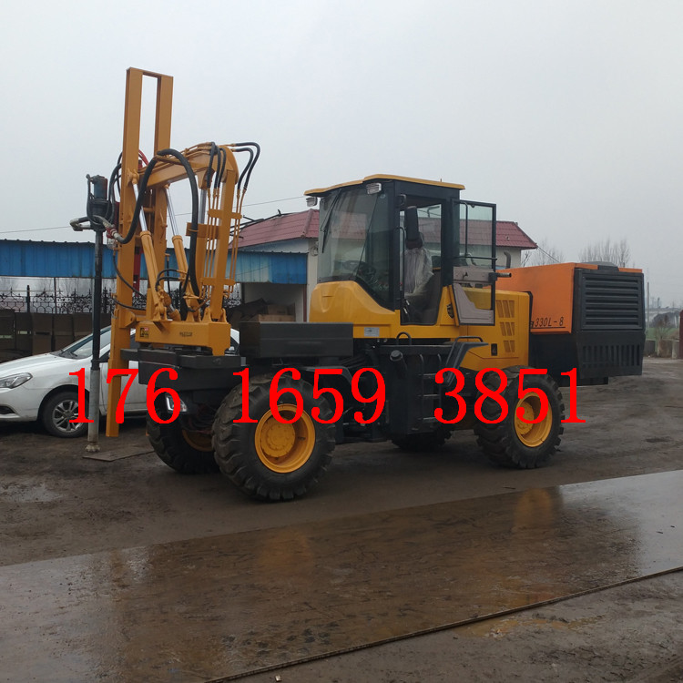 940鏟車改裝公路護(hù)欄鉆孔機(jī) 波形護(hù)欄打樁機(jī) 高速公路護(hù)欄立柱打樁機(jī)