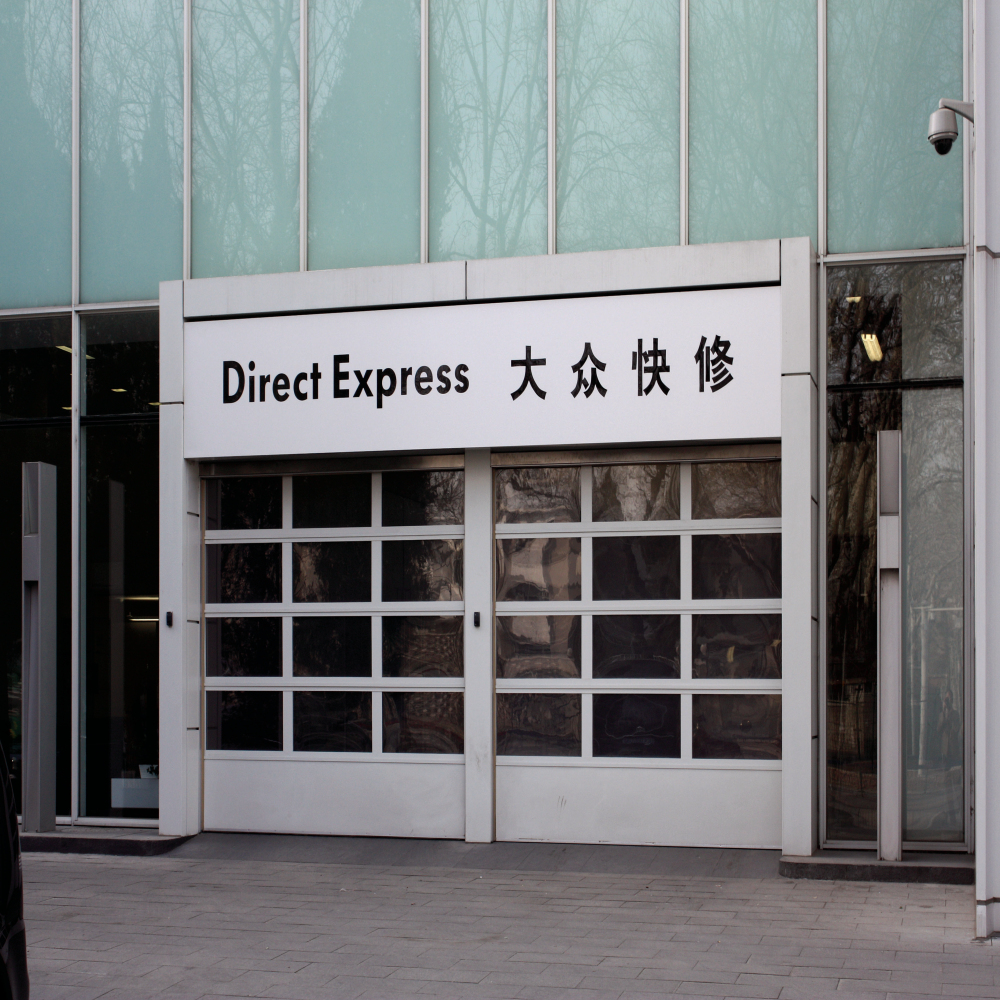 旭恒環(huán)照保溫工業(yè)滑升門垂直提升翻板門