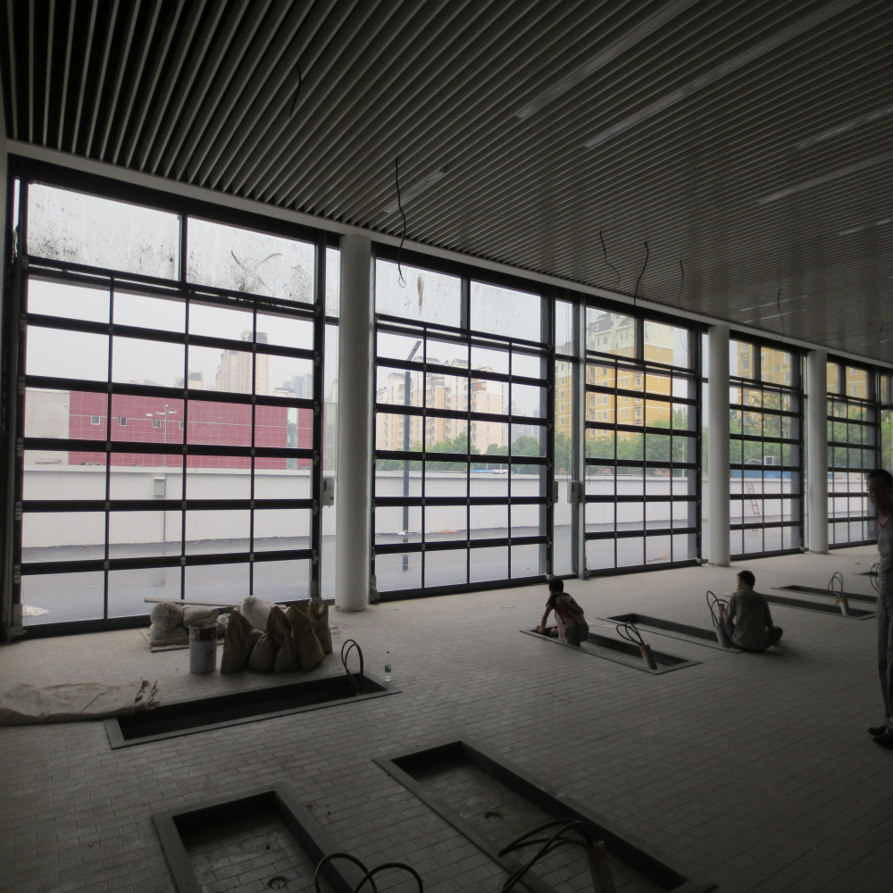 全國聯(lián)保旭恒環(huán)照透明滑升門 遙控滑升門 自動(dòng)感應(yīng)滑升門