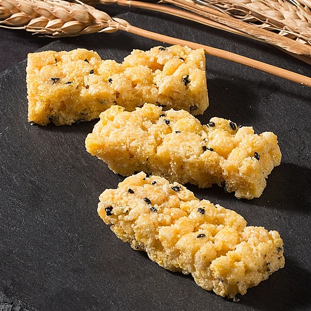 好樂多米糖 傳統(tǒng)糕點 番薯絲玉米年糕江米糖 休閑懷舊零食 果干粗糧廠家 休閑食品廠家