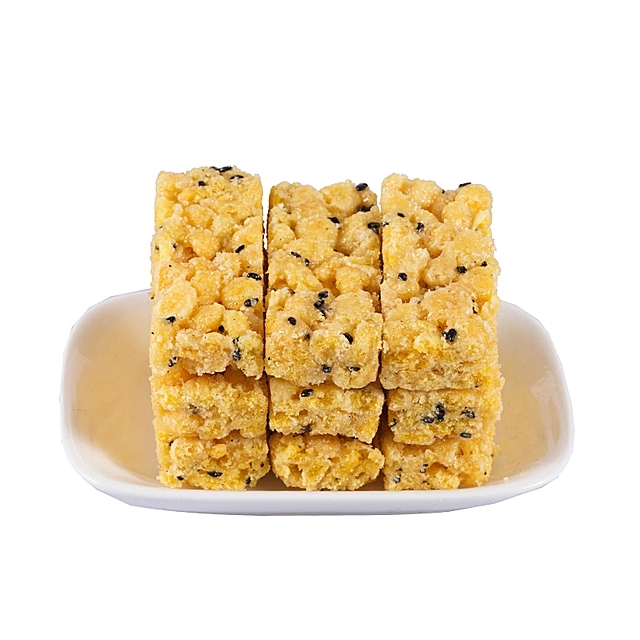 好樂多米糖 傳統(tǒng)糕點 番薯絲玉米年糕江米糖 休閑懷舊零食 果干粗糧廠家 休閑食品廠家