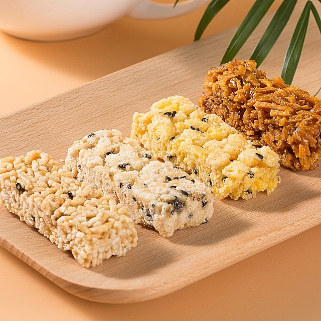 好樂多米糖 傳統(tǒng)糕點 番薯絲玉米年糕江米糖 休閑懷舊零食 果干粗糧廠家 休閑食品廠家