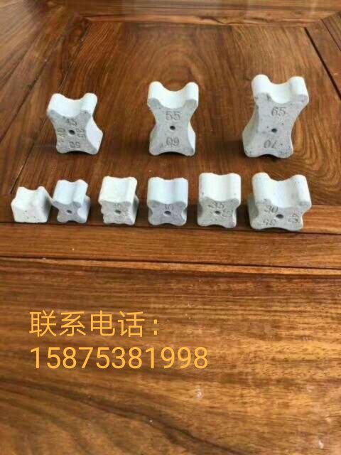 廣東梅花水泥墊塊廠家供應(yīng)，混凝土墊塊批發(fā)，梅花形狀混凝土墊塊價格