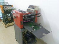 高速欄柵吸風(fēng)式折頁(yè)機(jī)  欄柵吸風(fēng)式折頁(yè)機(jī)