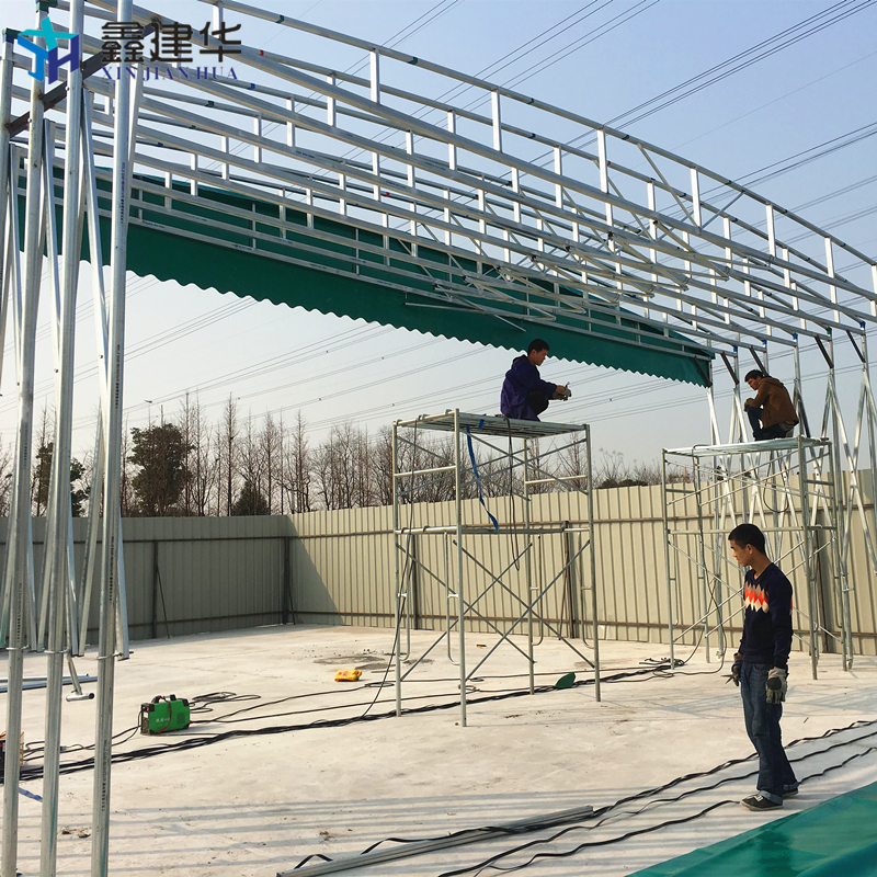 青島倉儲(chǔ)防火推拉棚定制廠家_室外防雨遮陽電動(dòng)伸縮雨棚使用效果怎么樣