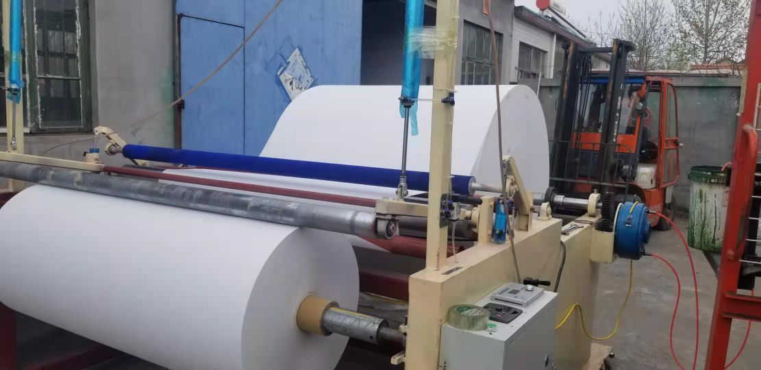 滾筒式復(fù)卷開片機(jī)