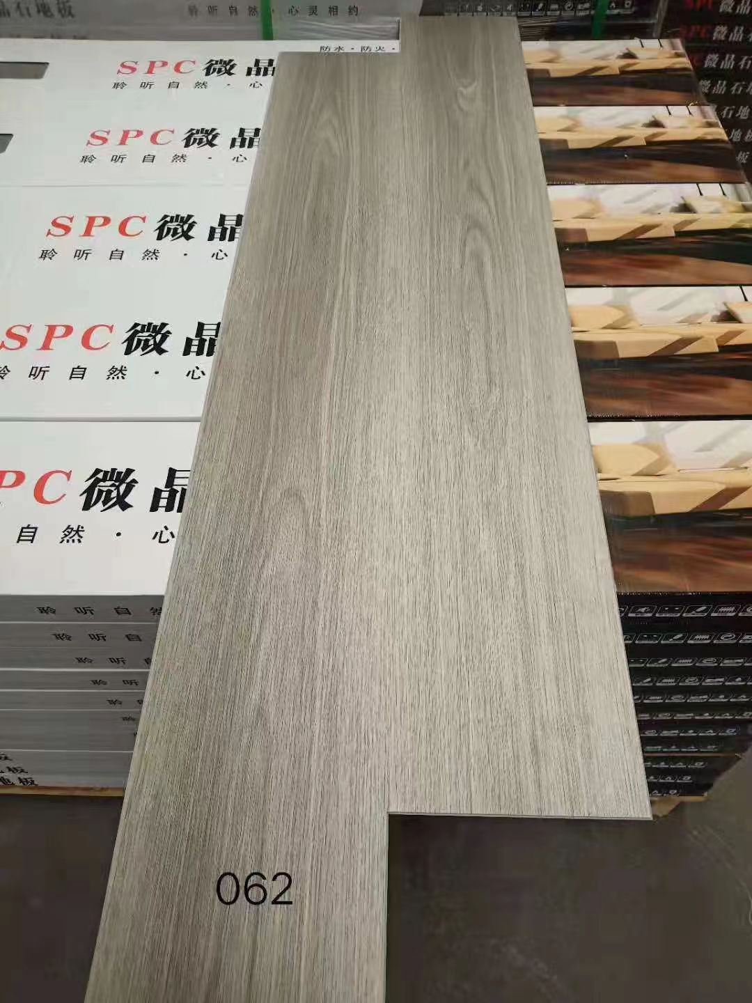 石塑spc地板pvc鎖扣卡扣式臥室家用工程耐磨防水地磚木紋石塑地板 石塑鎖扣地板SPC地板耐磨